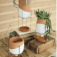 Elegant Set Of Three Natural And White Clay Pots With Wire Stands