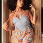Playful Distressed Denim Romper with Orange Rope