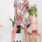 Celeste Full Size Paisley Print Short Sleeve Mini Dress with Pockets